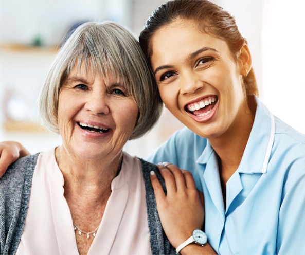 Nurse and patient laughing